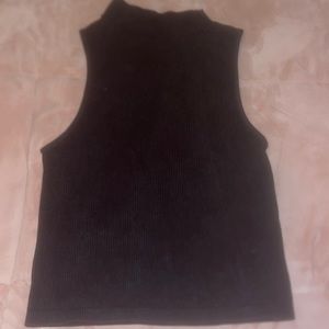 Black sleeve less turtle neck